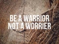 Be a warrior not a worrier text with vintage background. Inspirational motivational quote.ÃÂ 